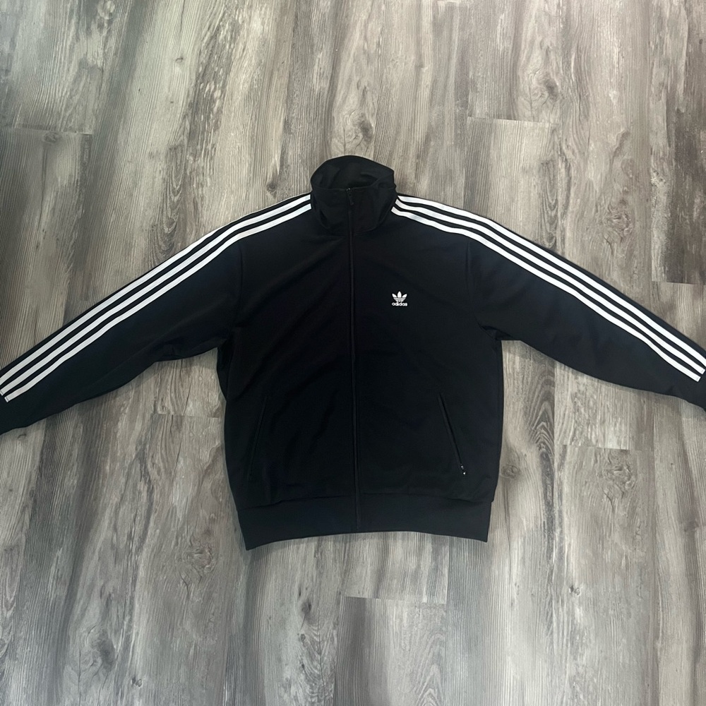 Woman’s Adidas track jacket